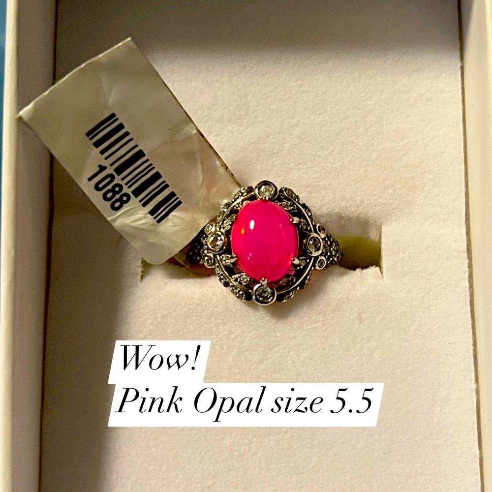 Genuine Pink Opal set in a beautiful Sterling setting. Size 5.5